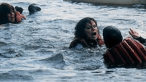 Photo: Image from the film, Julie Walters' character in a life vest having a bad time in a river.