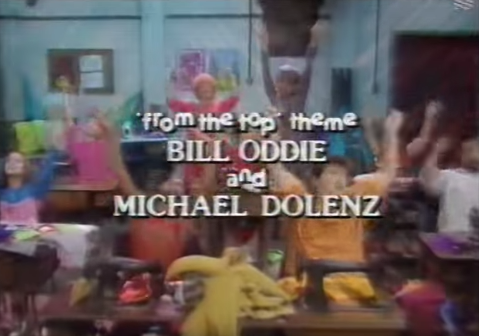 SCREENCAP FROM END CREDITS: 
"From the Top Theme by Bill Oddie and Michael Dolenz"